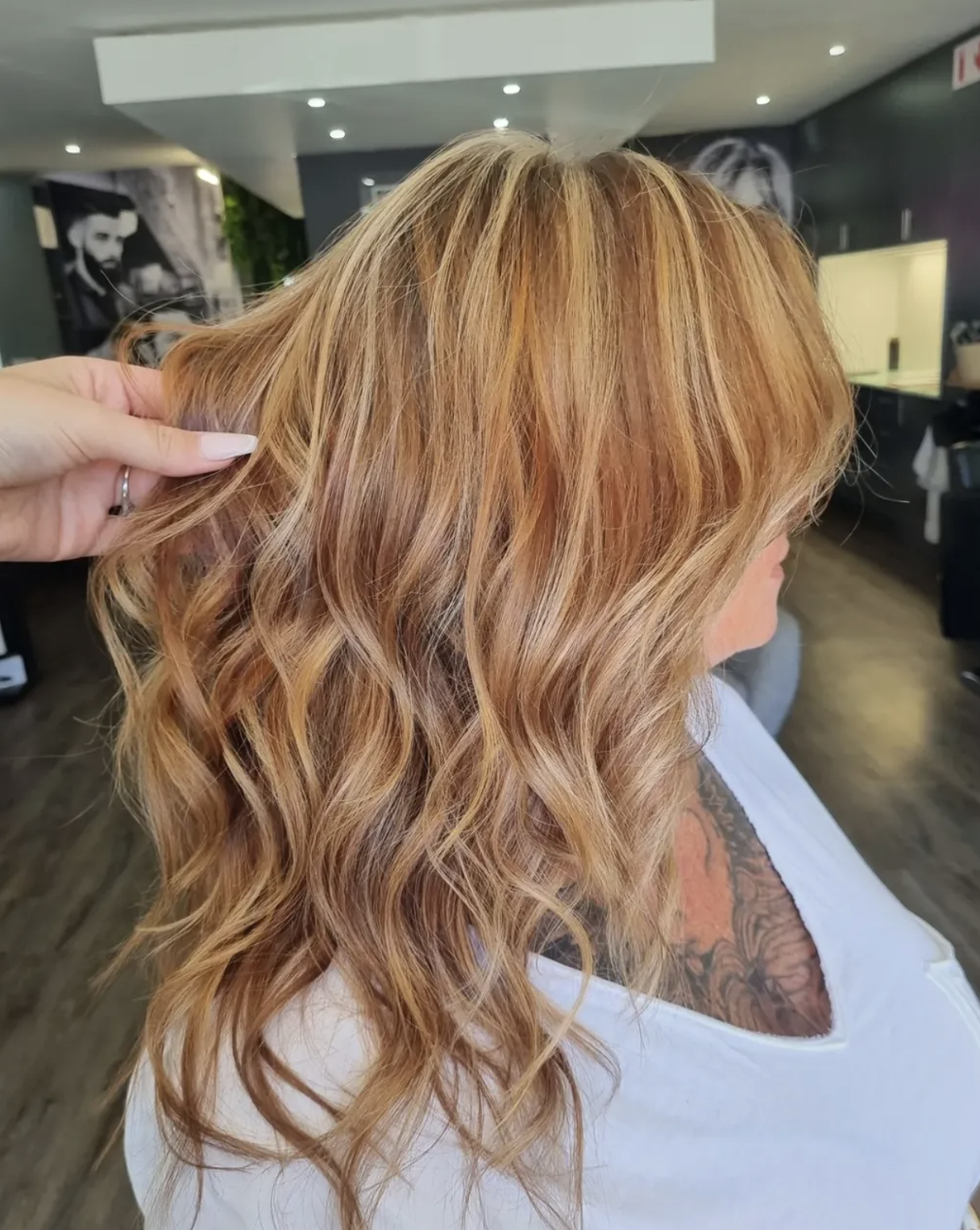 Copper strawberry-blonde waves styled at Liv Hair Studio