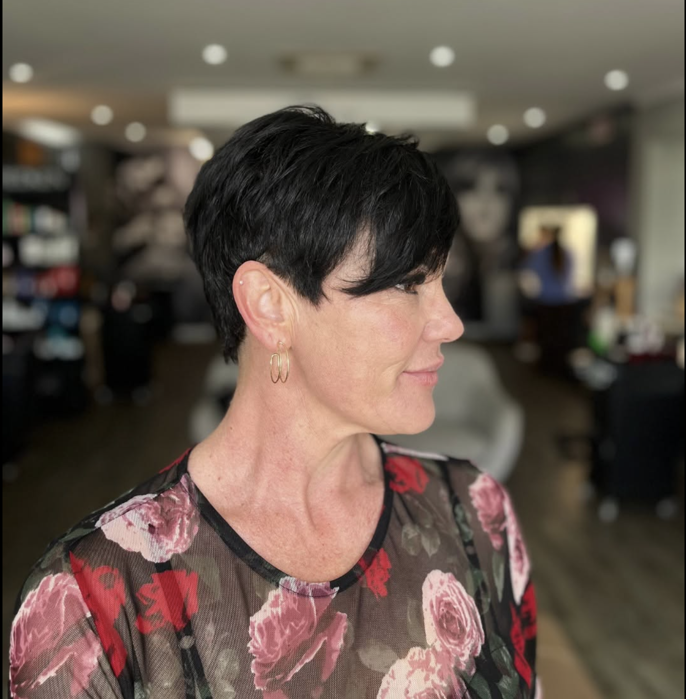 Textured dark pixie cut, side profile styled at Liv Hair Studio